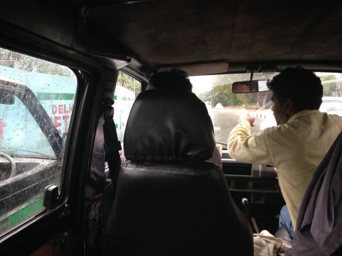 A furtive shot from inside the replacement rickshaw van. Cuticles trimmed. Drivers gesticulating at traffic. All is well. 